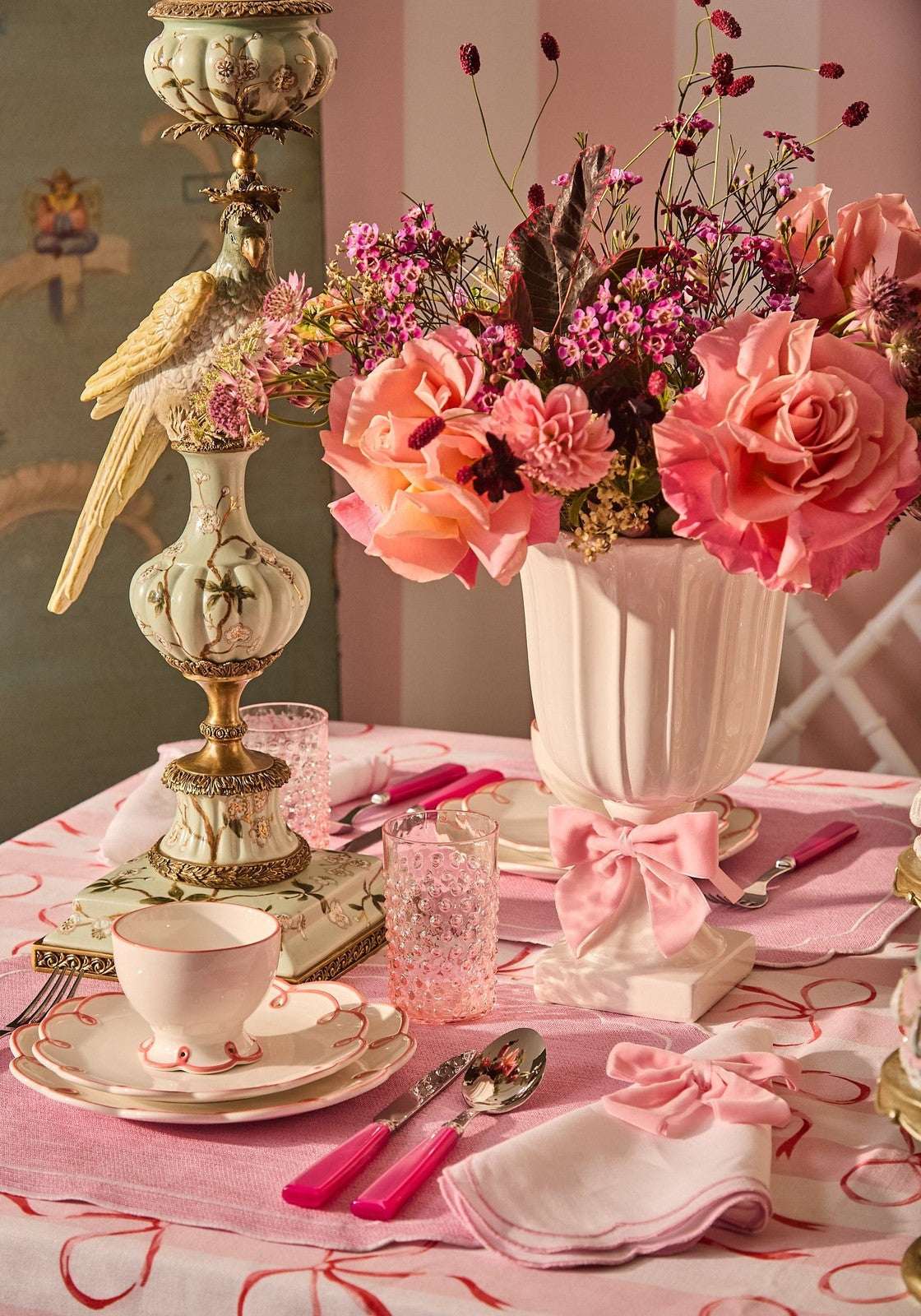 Elegant table setting featuring a Casa by Josephine Jenno Nibbles Bowl with floral decor and pink accents
