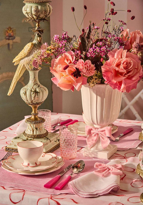 Elegant table setting featuring a Casa by Josephine Jenno Nibbles Bowl with floral decor and pink accents