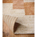 Nomad Rug with a geometric pattern in warm tones, perfect for adding style to any room