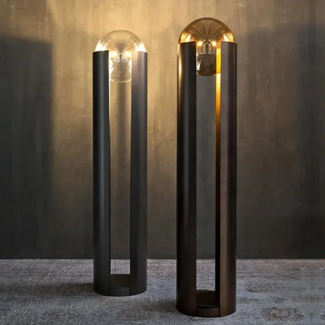 Norda Lamp by Nisu Home featuring a sleek design with a round glass bulb and stylish metallic base