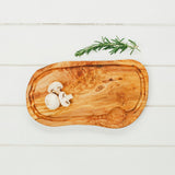 Selbrae House Carving Board in natural wood with mushrooms and rosemary for culinary use
