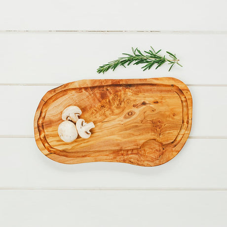 Selbrae House Carving Board in natural wood with mushrooms and rosemary for culinary use