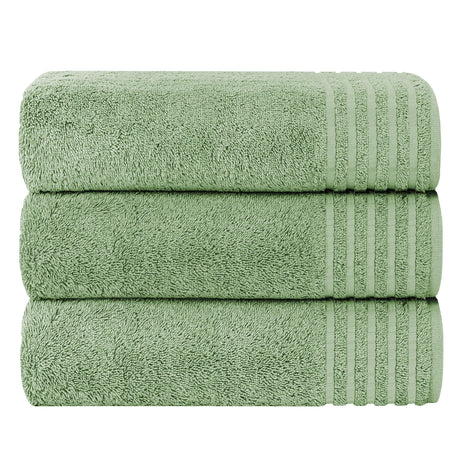 Set of soft green OLIVIA ROCCO bath sheets stacked neatly for stylish bathroom decor