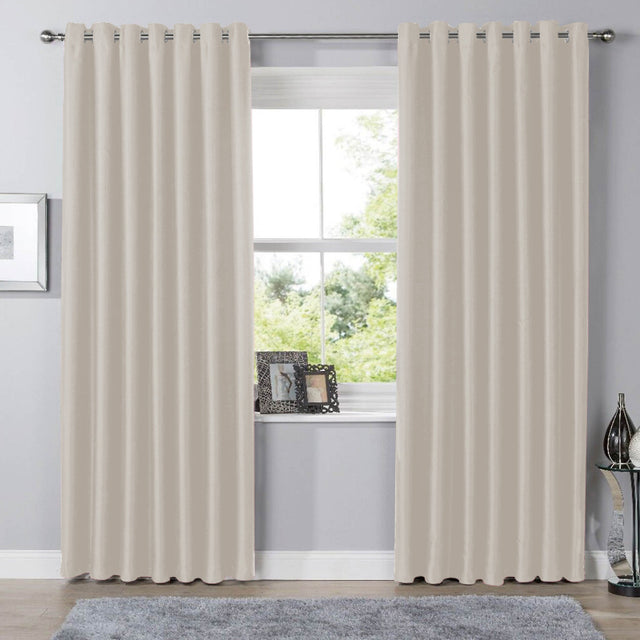 OLIVIA ROCCO Eyelet Curtains in beige, offering a stylish finish for your window decor