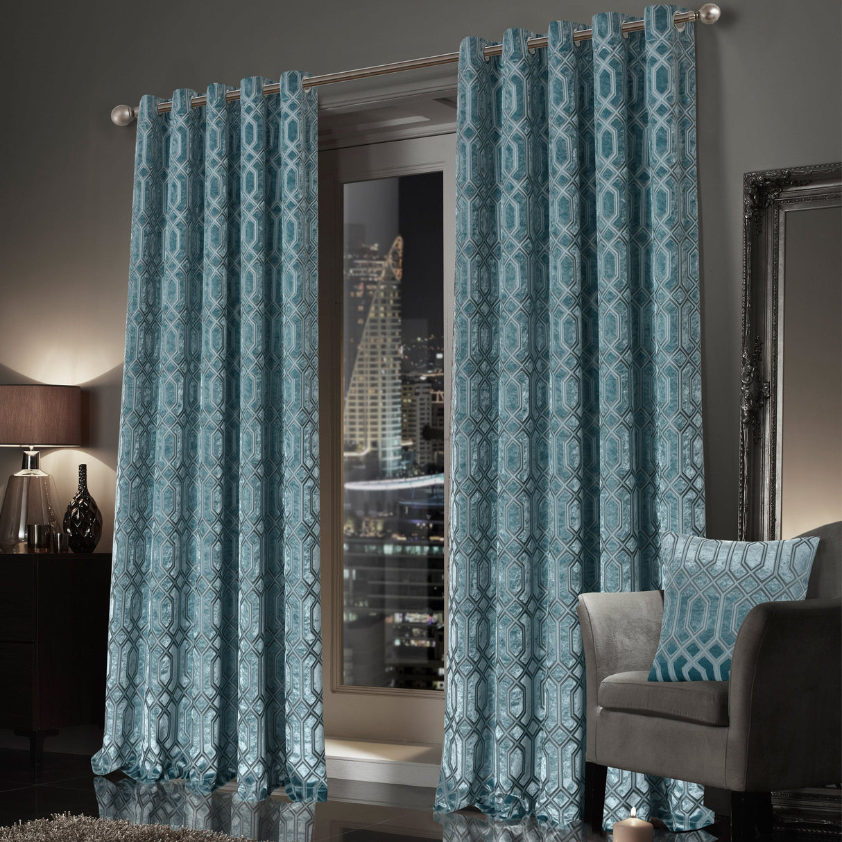OLIVIA ROCCO Eyelet Curtains in teal with a geometric pattern, perfect for stylish window dressing