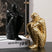Nisu Home Decorative Abstract Statue Ornament in Black and Gold Sitting Pose