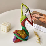 Colourful Nisu Home ornament in a graceful pose, perfect for home decor and artistic displays