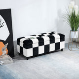 Black and white checkerboard Ottoman from Wise Galleria for stylish living room seating