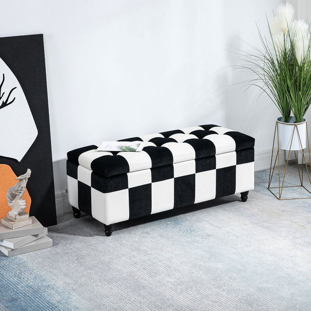 Black and white checkerboard Ottoman from Wise Galleria for stylish living room seating