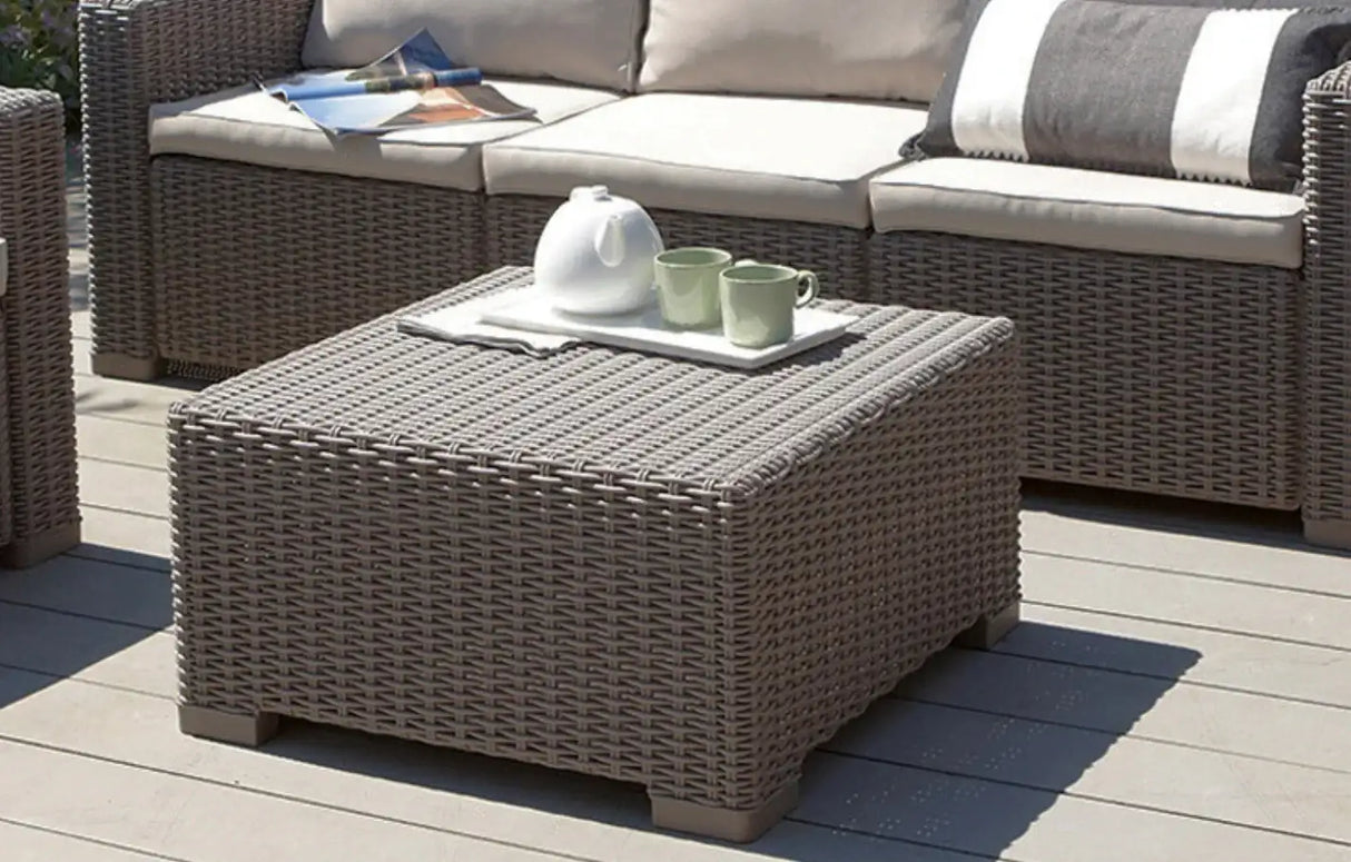 MINT Outdoor Coffee Table in grey wicker design with a teapot and cups on a decorative tray