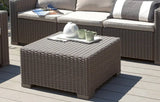 MINT Outdoor Coffee Table in grey wicker design with a teapot and cups on a decorative tray