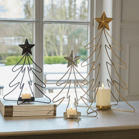 Outline Star Candle Holders in Gold and Black, perfect for Christmas decoration and enhancing festive ambiance