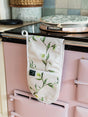 Avalon Home UK Floral Oven Glove Hanging on a Vintage Stove for Safe Baking