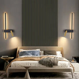 Modern wall lamp from Light My House illuminating a stylish bedroom with a sleek design