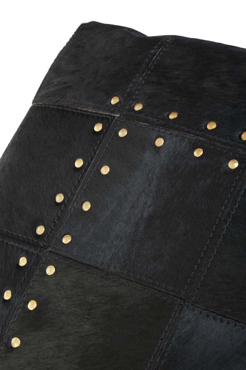 Black Patchwork Cushion with Gold Studs for a Stylish Home Decor Accent