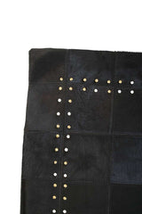 Orsina Patchwork Cushion in black with decorative studs for stylish home decor