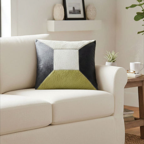 Orsina Patchwork Cushion in modern design with green, black, and cream elements for stylish home decor