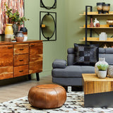 Stylish living room featuring a Patchwork Cushion on a grey sofa with wooden furniture