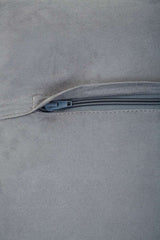 Close-up of Orsina Patchwork Cushion showing the sleek zip closure detail