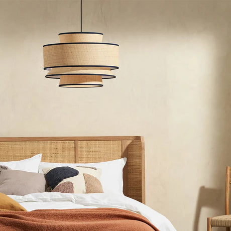Nisu Home Pendant Light in a stylish bedroom setting with soft bedding and natural decor