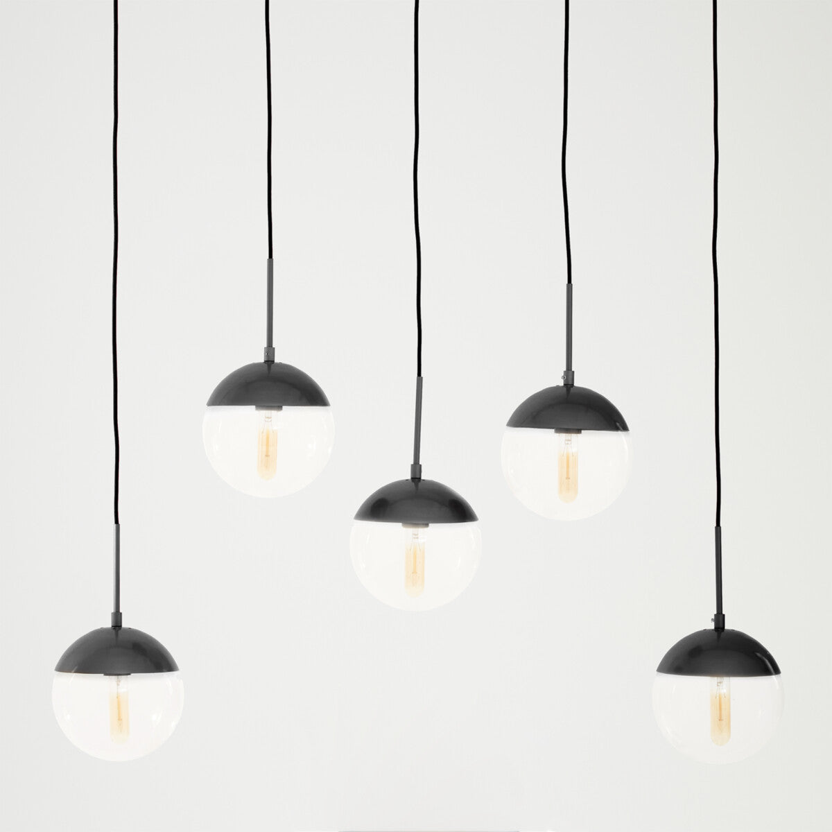 Orsina Pendant Light with five globes and black finish, ideal for modern living spaces