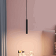 Minimalist black pendant light hanging in a modern living space for stylish illumination