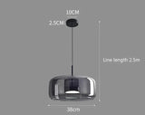 Nisu Home Pendant Light in a modern design with clear glass shade and adjustable length of 2.5m