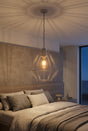 Orsina Pendant Light in a modern bedroom, casting beautiful shadows on the wall