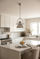 Orsina Pendant Light in a modern kitchen with white cabinetry and marble countertops