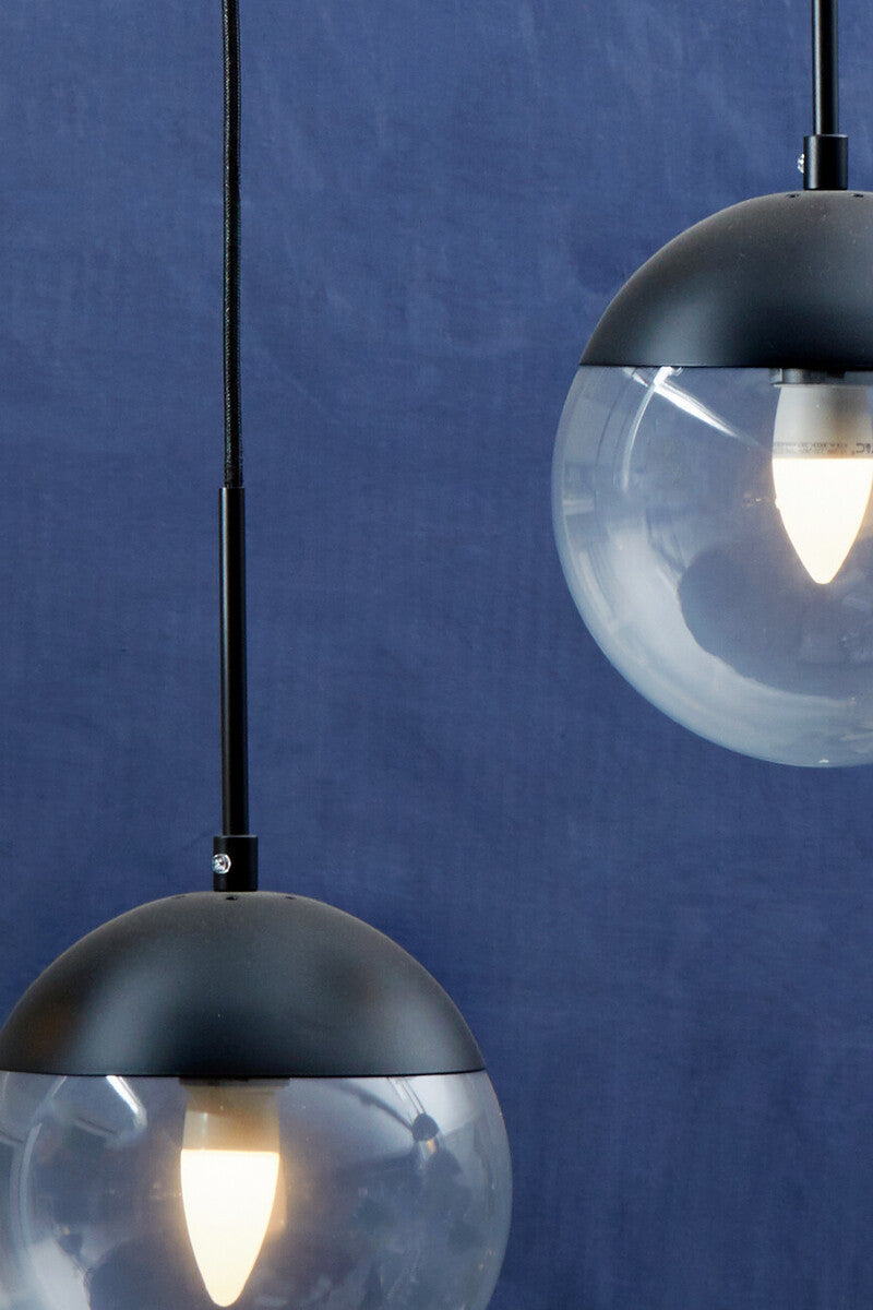 Orsina Pendant Light with Clear Glass Shade and Black Metal Fixture for Modern Interiors