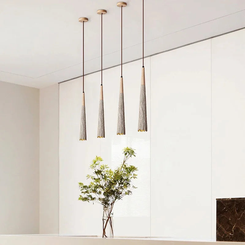 Nisu Home Pendant Light with four slender hanging fixtures ideal for modern interiors