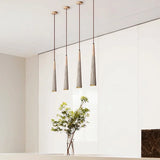 Nisu Home Pendant Light with four slender hanging fixtures ideal for modern interiors