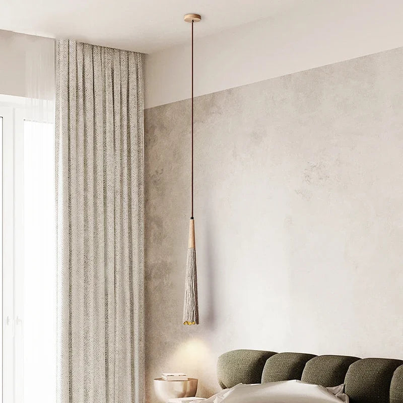 Nisu Home Pendant Light with a minimalist design, featuring a wooden accent and soft glow for modern interiors