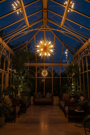 Stunning Orsina pendant light illuminating a modern conservatory with lush greenery