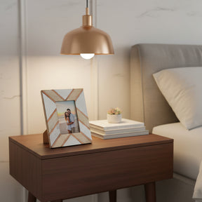 Orsina Photo Frame in a stylish design displayed on a bedside table with books and a lamp