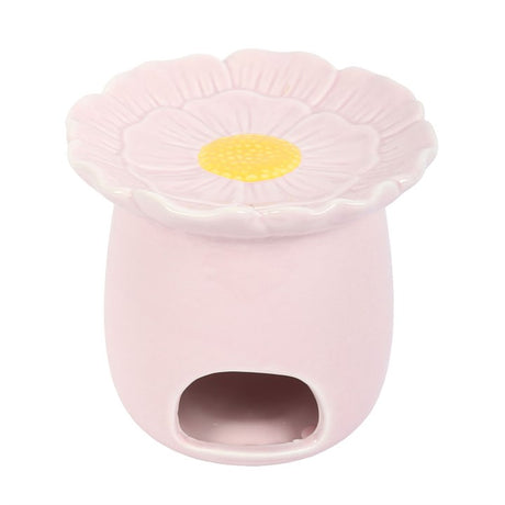 Pink flower-shaped oil burner for melting wax and creating a fragrant atmosphere