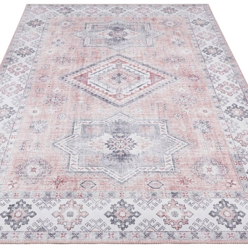 Pink Rug with Vintage Design Featuring Geometric Patterns and Soft Pastel Hues
