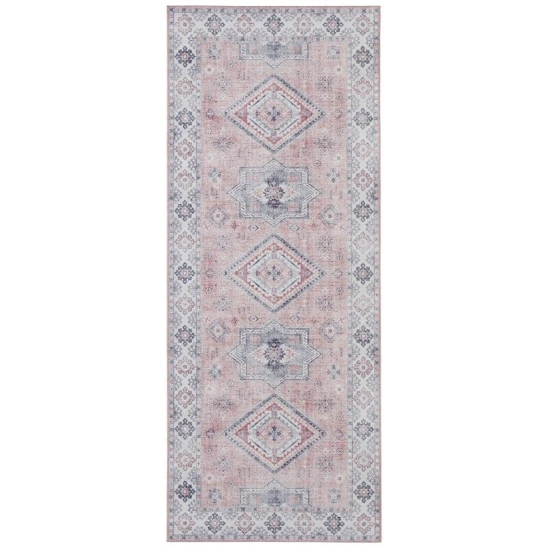 Stylish pink rug featuring intricate diamond patterns for modern home decor