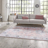 Elegant Pink Rug with intricate patterns, enhancing a modern living room setting