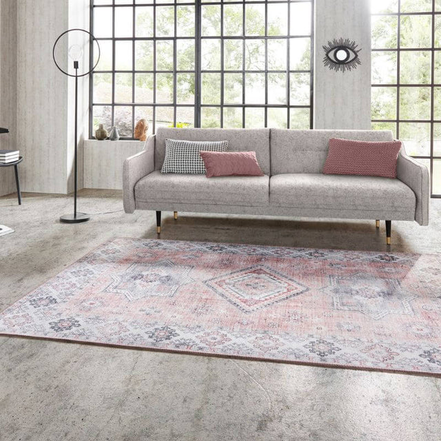 Elegant Pink Rug with intricate patterns, enhancing a modern living room setting