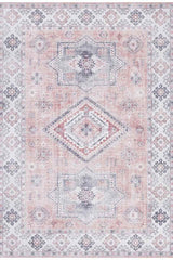 Elegant pink rug with intricate patterns and floral designs, perfect for modern home decor