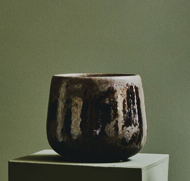 Orsina ceramic planter in earthy tones, perfect for modern home decor and showcasing indoor plants