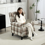 Comfortable reclining armchair in plaid design, perfect for relaxing while using a laptop