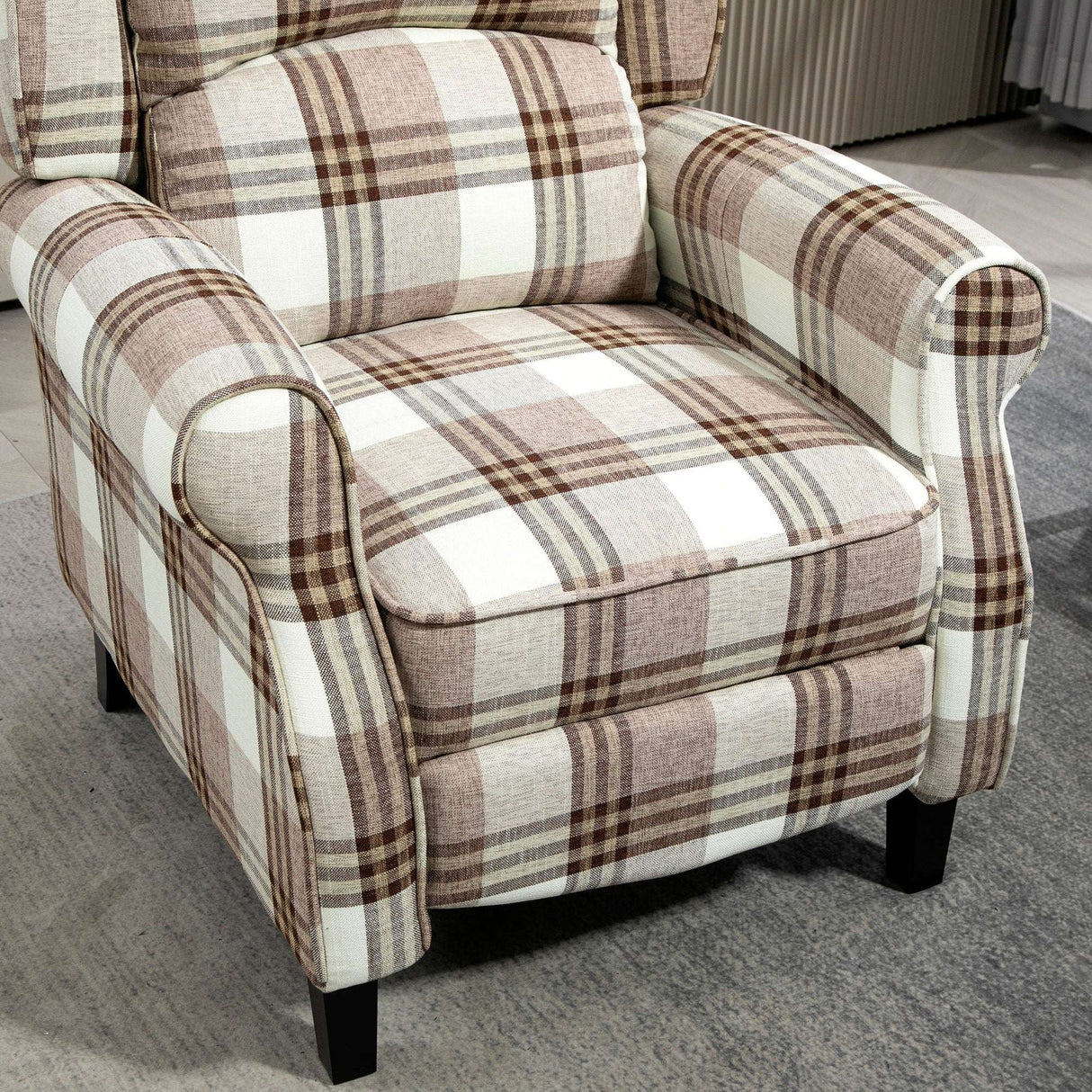 Stylish reclining armchair by Wise Galleria with a plaid pattern for comfortable seating