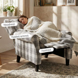 Comfortable reclining armchair with padded armrests and a soft footrest for ultimate relaxation
