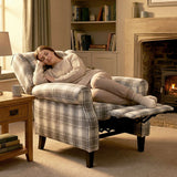 Cosy reclining armchair from Wise Galleria with a plaid pattern, perfect for relaxation and comfort