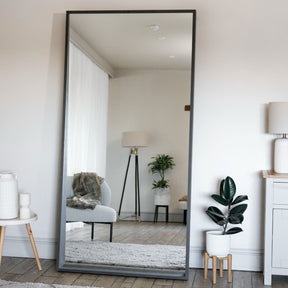 Sleek Rectangle Mirror by Jobu Home, framed in black, perfect for modern interiors