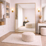 Stylish Rectangle Mirror with a Gold Frame in a Modern, Light-Filled Dressing Room
