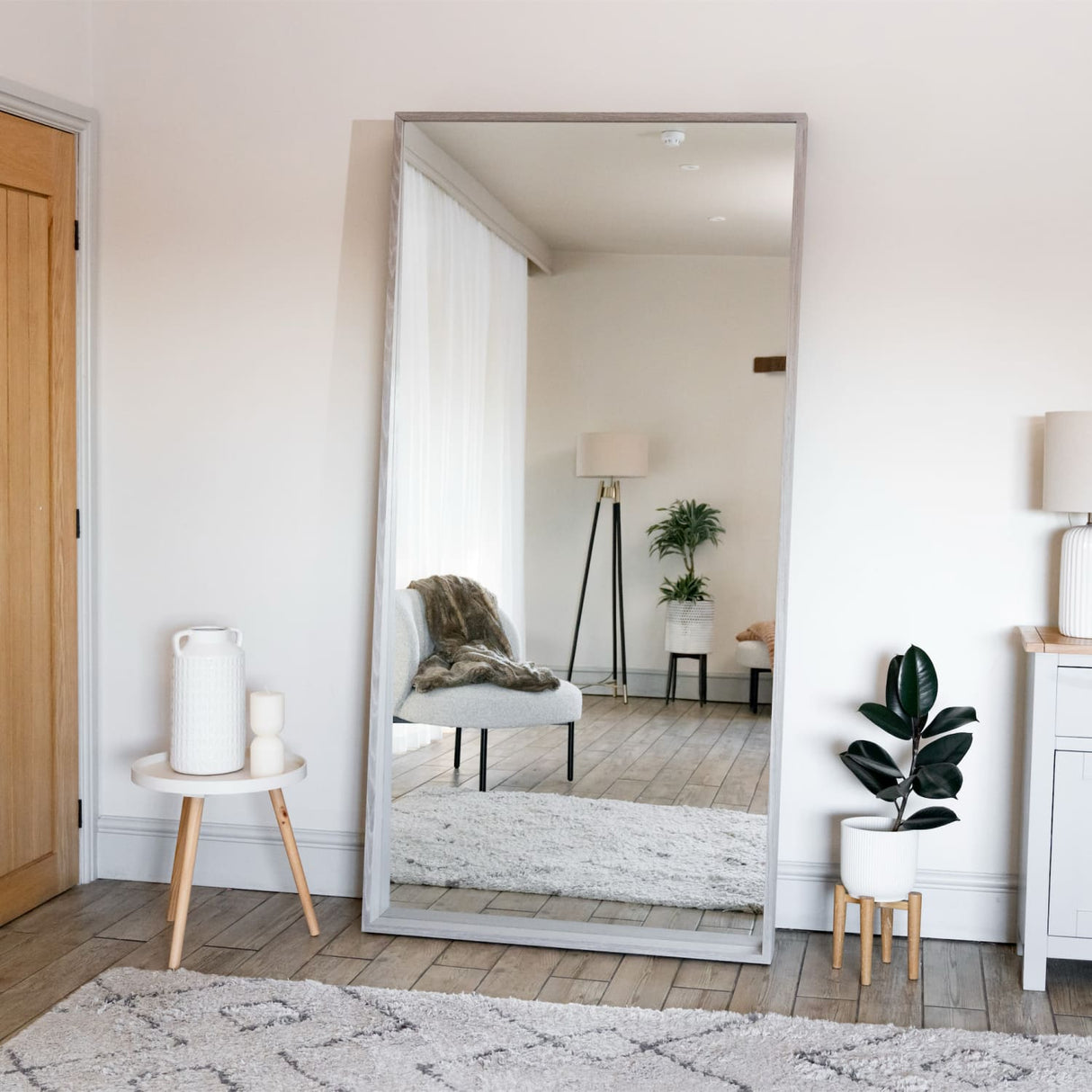 Jobu Home Rectangle Mirror with a sleek frame, perfect for modern living spaces