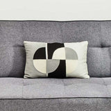 Orsina Rectangular Cushion with a stylish geometric design placed on a grey sofa